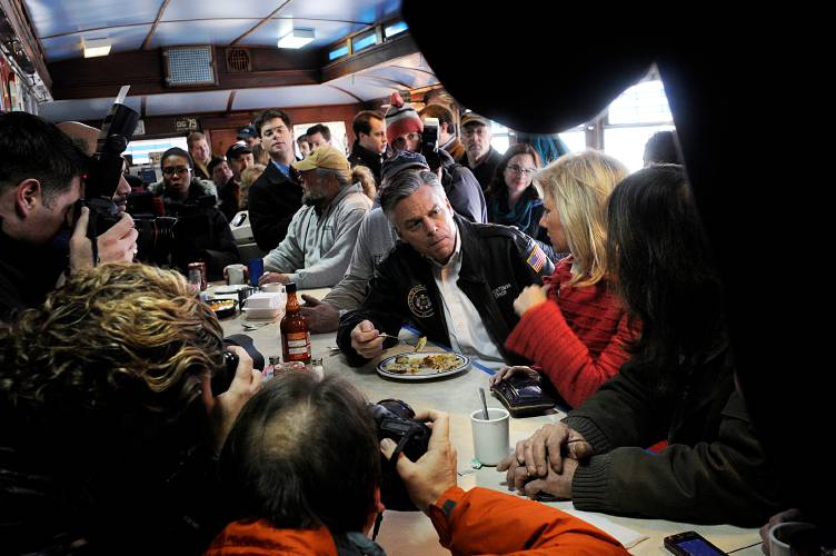 Utah Governor Jon Huntsman and his wife Mary Kaye Huntsman talk with Skip Santolucito of Acworth, N.H., right, during a stop at Daddypops Tumble Inn Diner in Claremont, N.H., on January 9, 2012. Huntsman toured the state looking to pick up votes before the primary. (Valley News - James M. Patterson) Copyright Valley News. May not be reprinted or used online without permission. Send requests to permission@vnews.com.