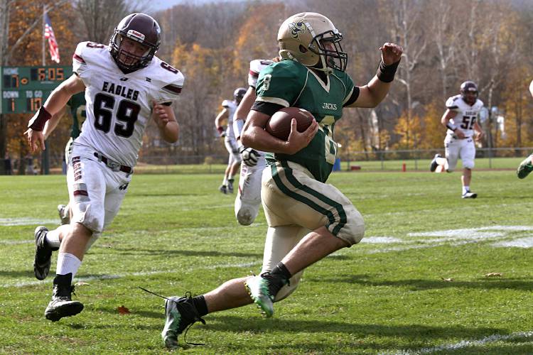 Wyatt Allenson (69) and his Mount Abraham teammates had trouble catching scrambling Windsor quarterback Maison Fortin during their VPA Division III football semifinal in Windsor, Vt., on Nov. 5, 2022. Windsor won, 45-6, and faces BFA-Fairfax in the state championship. (Valley News - Geoff Hansen) Copyright Valley News. May not be reprinted or used online without permission. Send requests to permission@vnews.com


.