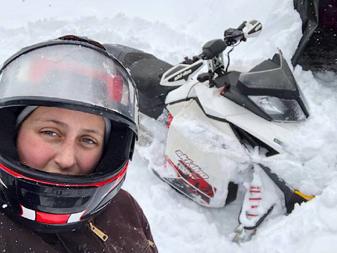 Christina Chatlos poses for a self portrait with a snowmobile. Her parents, Andrew and Marilyn Chatlos said she used to ride the VAST trail from her home in Williamstown to have dinner at a restaurant in Berlin, Vt. Photo courtesy of Thomas Ferranti