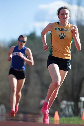 Anita Miller, of White River Valley, right, leads in the 1500 meter before being overtaken by Ava Hayden, of Thetford, left, for the win in Windsor, Vt., on Tuesday, April 16, 2024. Hayden finished first with a time of 4:56.37, followed by Miller at 4:57.43. (Valley News - James M. Patterson) Copyright Valley News. May not be reprinted or used online without permission. Send requests to permission@vnews.com.