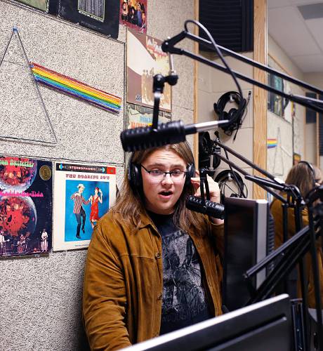 Eleventh-grader Levi Saulnier records a voice track for the X101 Mascoma High School Radio at Mascoma Valley Regional High School in Canaan, N.H., on Thursday, April 25, 2019. The radio station is one of the extended learning opportunities at the school and is completely student-run. 