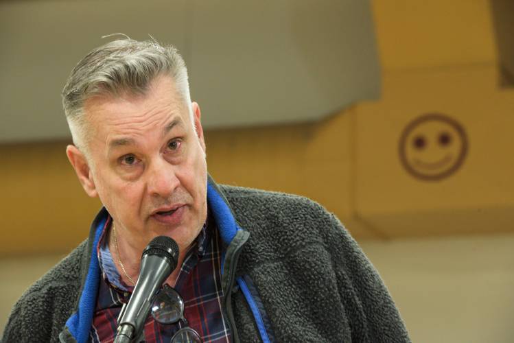 Tim Lenihan comments on increases in the Enfield, N.H., budget during Town Meeting at Enfield Village School on Saturday, March 16, 2024. (Valley News - James M. Patterson) Copyright Valley News. May not be reprinted or used online without permission. Send requests to permission@vnews.com.