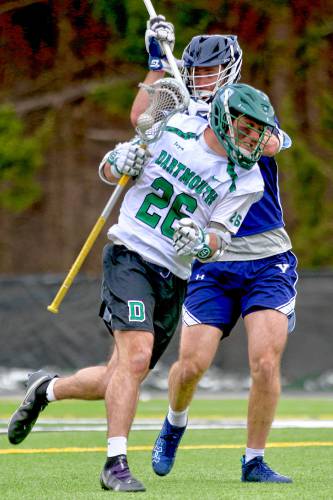 Dartmouth College's Vincent Gandolfo works against Yale defenseman Jack Stuzin during the Ivy League teams' April 13, 2024, meeting on Scully-Fahey Field in Hanover, N.H. Yale won, 20-13. (Valley News - Tris Wykes) Copyright Valley News. May not be reprinted or used online without permission.