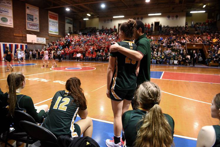 Windsor head coach Kabray Rockwood consoles senior Sydney Perry during the last few seconds of their game with Hazen for the VPA D-III girls basketball state championship in Barre, Vt., on Saturday, March 9, 2024. Hazen won, 66-56. (Valley News - Jennifer Hauck) Copyright Valley News. May not be reprinted or used online without permission. Send requests to permission@vnews.com.