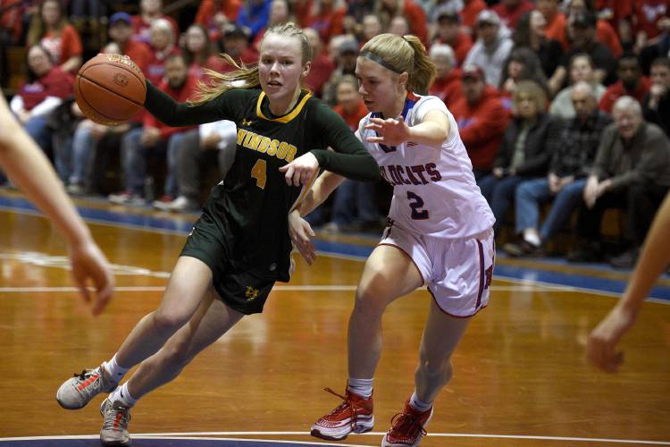 Windsor's Audrey Rupp drives to the top of the key with Hazen's Tessa Luther on her during the VPA D-III girls basketball state championship in Barre, Vt., on Saturday, March 9, 2024. Hazen won, 66-56. (Valley News - Jennifer Hauck) Copyright Valley News. May not be reprinted or used online without permission. Send requests to permission@vnews.com.