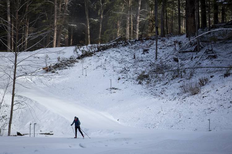 Betsey Geraghty, of West Fairlee, Vt., skis the Snow Making Loop at Oak Hill Outdoor Center in Hanover, N.H., on Thursday, March 21, 2024. Geraghty, who has been skiing at Oak Hill since the 90s, tries to ski every day in the winter when snow cover allows and said that the outdoor center’s new trail has helped to extend her season. “It’s a huge upgrade,” she said of the changes, especially the addition of a warming hut. (Valley News / Report For America - Alex Driehaus) Copyright Valley News. May not be reprinted or used online without permission. Send requests to permission@vnews.com.