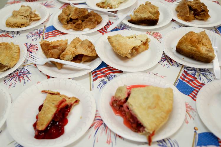 The Rotary Clubs of Lebanon and Lebanon-Riverside baked nearly 200 pies for the Great American All-You-Can-Eat Pie Buffet at the Upper Valley Senior Center in Lebanon, N.H., on Saturday, July 4, 2015. (Valley News - Sarah Shaw) Copyright Valley News. May not be reprinted or used online without permission. Send requests to permission@vnews.com.