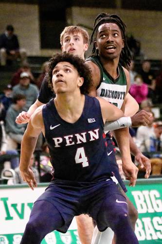 Dartmouth College's Jayden Williams looks for a rebound behind Penn's Tyler Perkins during the Ivy League teams' Feb. 23, 2024, game at Leede Arena in Hanover, N.H. Penn won, 82-69. (Valley News - Tris Wykes) Copyright Valley News. May not be reprinted or used online without permission. —Tris Wykes valley news photographs — Tris Wykes