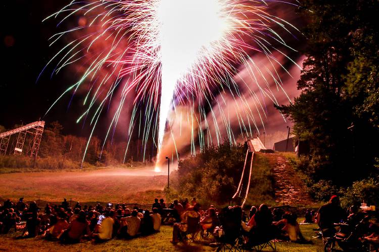 A finale of constant fireworks light up the sky at the Storrs Hill Ski Area to the delight of the crowd at the base in Lebanon, N.H., on Wednesday, July 4, 2018. (Valley News - August Frank) Copyright Valley News. May not be reprinted or used online without permission. Send requests to permission@vnews.com. 