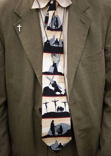 Associate Larry Guaraldi, of Canaan, N.H., wears a tie depicting the Last Supper, Crucifixion and Resurrection of Jesus during the closing of the Shrine of Our Lady of La Salette in Enfield, N.H., on Tuesday, Sept. 19, 2023. (Valley News / Report For America - Alex Driehaus) Copyright Valley News. May not be reprinted or used online without permission. Send requests to permission@vnews.com.