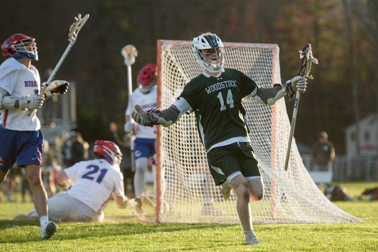Reid Allegretti, of Woodstock, celebrates after scoring against Hartford in White River Junction, Vt., on onday, April 22, 2024. Woodstock won 11-10. (Valley News - James M. Patterson) Copyright Valley News. May not be reprinted or used online without permission. Send requests to permission@vnews.com.