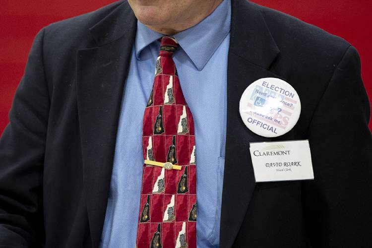 Claremont Ward Clerk David Roark wears a tie emblazoned with the state of New Hampshire at Claremont Middle School in Claremont, N.H., on Tuesday, Jan. 23, 2024. (Valley News / Report For America - Alex Driehaus) Copyright Valley News. May not be reprinted or used online without permission. Send requests to permission@vnews.com.