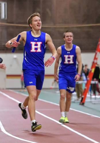 Hartford's Bennett Moreno (with baton) and Gabe Guillette were on the winning 4 by 400 relay with Jack Fournier-Stephens and Payton Bessette. (BigZig Photography)