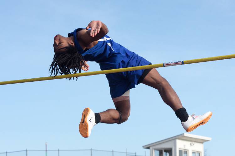 Hartford junior Ayodele Lowe clears 1.62 meters in the high jump before going on to win with a jump of 1.93 meters in Lebanon, N.H., on Tuesday, April 24, 2024. (Valley News - James M. Patterson) Copyright Valley News. May not be reprinted or used online without permission. Send requests to permission@vnews.com.