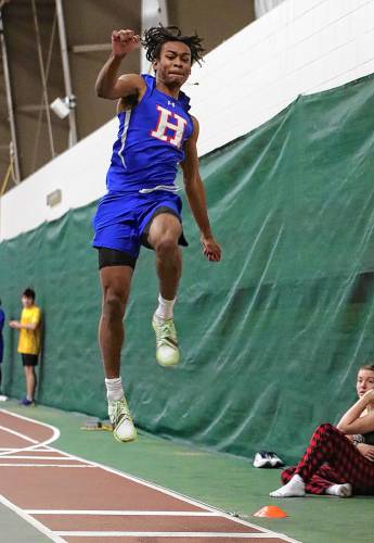 Hartford's Ayodele Lowe took third in the long jump at the Vermont Division II state indoor track meet won by the Hurricanes. Lowe won the high jump and was on the winning 4 by 200 relay team with Gabe Guillette, Payton Bessette and Hayden Hewitt. (BigZig Photography)