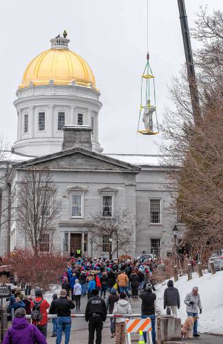 A statue of Ceres, a Roman goddess of agriculture, is installed atop the golden dome of the Vermont State House in Montpelier on Friday, November 30, 2018. (VtDigger - Glenn Russell)