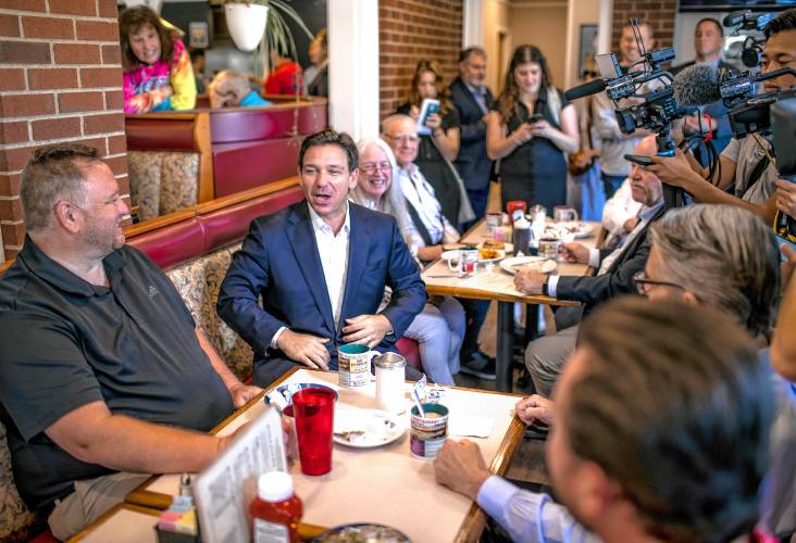 Florida Gov. Ron DeSantis grabbed his coffee and joined the patrons at the Windmill Restaurant for political talk on Tuesday morning, August 1, 2023.