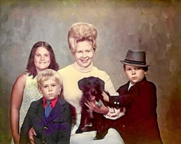 Joyce Conroy in 1972 with her children, Kathy, upper left, Brian, in hat, and Michael. Lucky, the family's Cocker Spaniel-Poodle mix, is center stage.