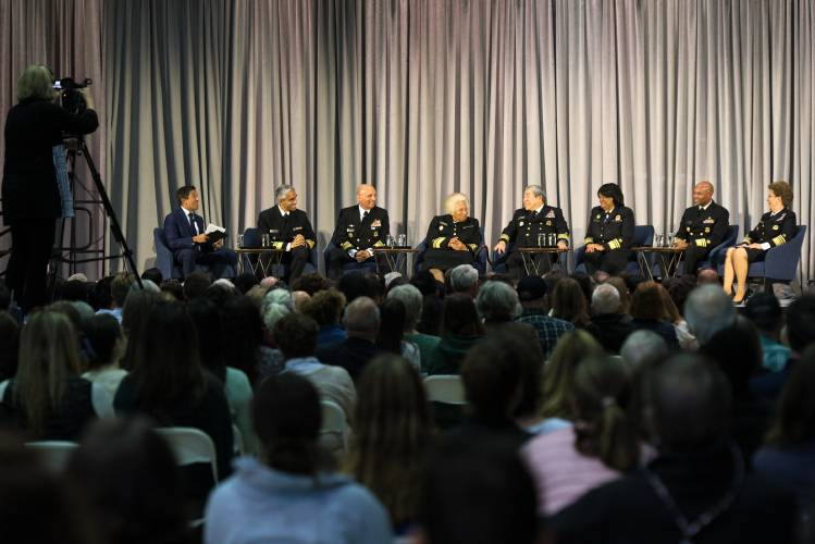 Sanjay Gupta, medical correspondent for CNN, left, moderates a roundtable discussion on mental health with Surgeon General, Vice Admiral Vivek Murthy, second from left, and six former surgeons general at Dartmouth College's Leede Arena in Hanover, N.H., on Thursday, Sept. 28, 2023. (Valley News - James M. Patterson) Copyright Valley News. May not be reprinted or used online without permission. Send requests to permission@vnews.com.
