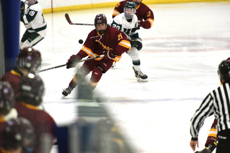 Lebanon's Mason Ballard brings the puck down during their game with Woodstock at the Philippe H. Bouthillier Holiday Classic hockey tournament in White River Junction, Vt., on Wednesday, Dec. 27, 2023, in White River Junction, Vt. Lebanon won, 4-0.  (Valley News - Jennifer Hauck) Copyright Valley News. May not be reprinted or used online without permission. Send requests to permission@vnews.com.