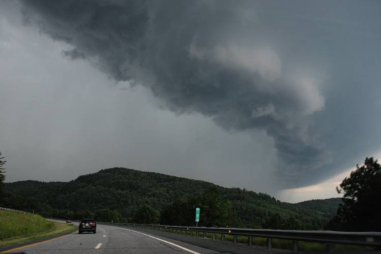 The leading edge of a severe thunderstorm passes over Interstate 89 in Royalton, Vt., on Thursday, July 13, 2023. Officials warned Vermont residents to remain alert as the storm was forecast to bring more heavy rain, hail, and and strong gusts. (Valley News - James M. Patterson) Copyright Valley News. May not be reprinted or used online without permission. Send requests to permission@vnews.com.