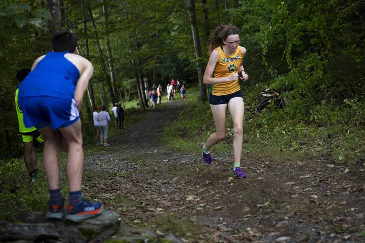White River Valley senior Anita Miller runs up the final hill of the course during a cross country meet at Thetford Academy in Thetford, Vt., on Tuesday, Sept. 12, 2023. Miller finished the race in second place with a time of 22:04. (Valley News / Report For America - Alex Driehaus) Copyright Valley News. May not be reprinted or used online without permission. Send requests to permission@vnews.com.