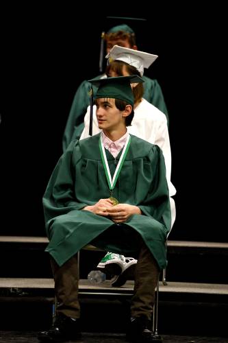 Rivendell Academy graduate Derek Vogelien listens during the school's commencement ceremony on Saturday, June 10, 2023, in Orford, N.H. (Valley News - Jennifer Hauck) Copyright Valley News. May not be reprinted or used online without permission. Send requests to permission@vnews.com.