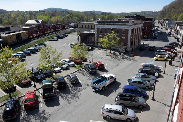 Traffic passes along South Main Street in White River Junction, Vt., Thursday, May 4, 2017. As parking becomes increasingly scarce downtown due to increased demand from downtown businesses and attractions, Hartford Police are enforcing a two hour limit for on-street parking, four hours for spaces facing the train tracks and allow all-day parking in municipal lots near the town hall and behind the former American Legion building. (Valley News - James M. Patterson) Copyright Valley News. May not be reprinted or used online without permission. Send requests to permission@vnews.com.