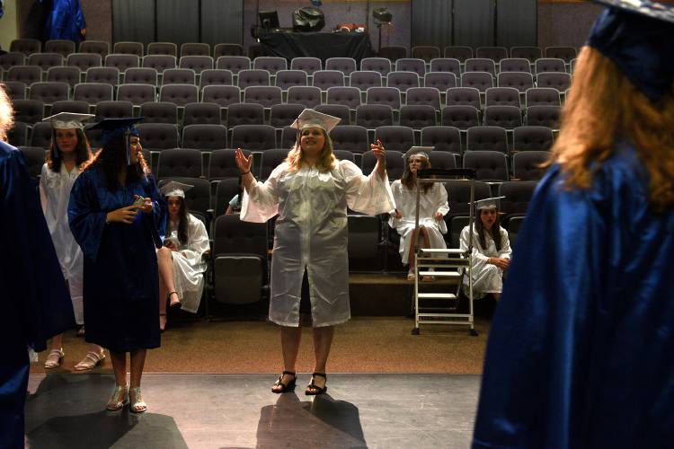 Before the start of the Thetford Academy commencement on Friday, June 9, 2023, in Thetford, Vt., graduate Kathy Darrah gathers classmates together for a photo of students who have gone through the Thetford school system since kindergarten.  (Valley News - Jennifer Hauck) Copyright Valley News. May not be reprinted or used online without permission. Send requests to permission@vnews.com.