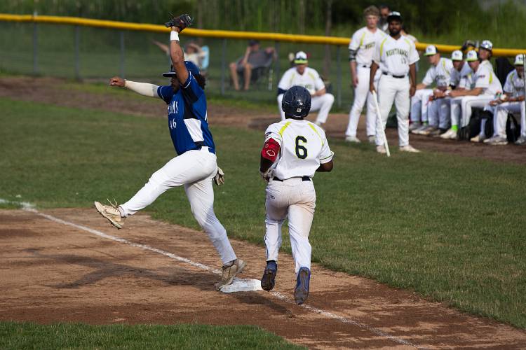 North Adams SteepleCats’ Cedric Rose (46) tags first base before Upper Valley Nighthawks’ Adarius Myers can reach it during a game at Maxfield Sports Complex in White River Junction, Vt., on Friday, June 30, 2023. (Valley News / Report For America - Alex Driehaus) Copyright Valley News. May not be reprinted or used online without permission. Send requests to permission@vnews.com.