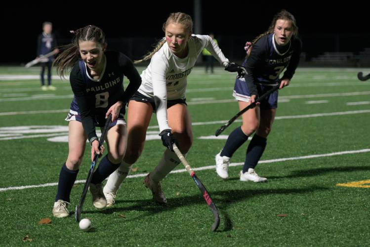Georgia Tarleton, of Woodstock, middle, keeps Spaulding's Caitlin Peacock, left, from turing toward goal as her teammate Ruby Harrington, right, provides support during their VPA Division 2 semifinal at St. Johnsbury Academy in St. Johnsbury, Vt., on Tuesday, Oct. 31, 2023. Woodstock won 1-0. (Valley News - James M. Patterson) Copyright Valley News. May not be reprinted or used online without permission. Send requests to permission@vnews.com.