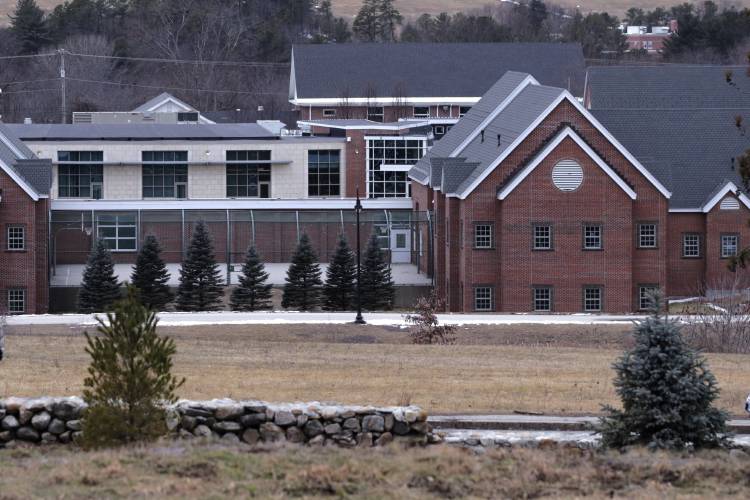 FILE - The Sununu Youth Services Center in Manchester, N.H., stands among trees, Jan. 28, 2020. Lawyers representing 1,400 men and woman who allege they were abused as children at New Hampshire’s youth detention centers said Tuesday, Feb. 20, 2024, they will recommend the state’s out-of-court settlement option for most of their clients if lawmakers approve a plan to greatly expand its scope. (AP Photo/Charles Krupa, File)