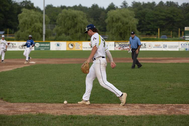 Upper Valley Nighthawks’ Jake Bullard (23) follows a slow-rolling ball to see if it will cross the foul line before reaching third base during a game against the North Adams SteepleCats at Maxfield Sports Complex in White River Junction, Vt., on Friday, June 30, 2023. (Valley News / Report For America - Alex Driehaus) Copyright Valley News. May not be reprinted or used online without permission. Send requests to permission@vnews.com.