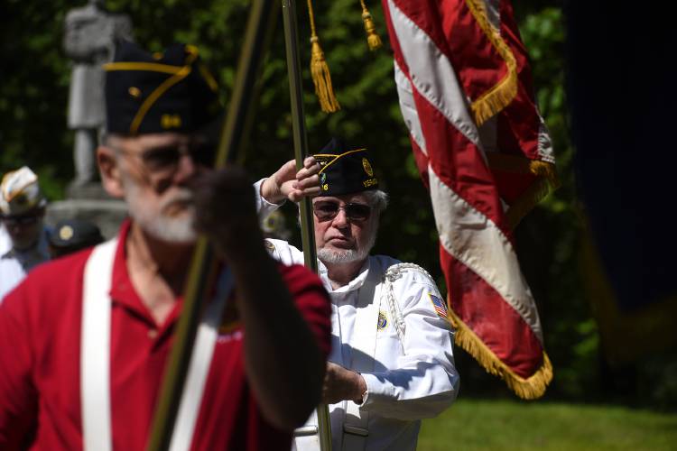 During Memorial Day services on Tuesday, May 30, 2023, Frederick Stebbins, of Quechee, Vt., participates in a wreath laying ceremony at the Hartford Point Cemetery in White River Junction, Vt. Stebbins is a member of American Legion Post 26. After the ceremony, veterans went on to three other locations in Harford for other brief ceremonies. Lu Johnson, of Wilder, Vt., a member of the American Legion Post 84, is on the left. (Valley News - Jennifer Hauck) Copyright Valley News. May not be reprinted or used online without permission. Send requests to permission@vnews.com.