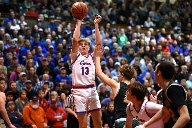 Hartford's Noah Danieli takes aim at the basket during their game with Montpelier at the VPA D-II boys basketball championship in Barre, Vt., on Saturday, March 2, 2024. Montpelier won, 58-49.(Valley News - Jennifer Hauck) Copyright Valley News. May not be reprinted or used online without permission. Send requests to permission@vnews.com.