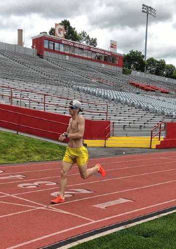 Chris Bustard runs the Moose League 800-meter race on May 27, 2017, at Boston University. Bustard finished in first place, completing the race in 2 minutes 12 seconds. (Meaghan Holmes photograph)
