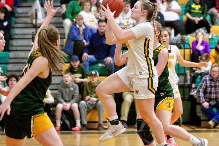 Windsor High's Brianna Barton goes up for a shot against West Rutland on Feb. 22, 2024, in Windsor, Vt. Windsor won, 53-32, avenging a loss to the Golden Horde earlier this season. (Valley News - Tris Wykes) Copyright Valley News. May not be reprinted or used online without permission. —Tris Wykes