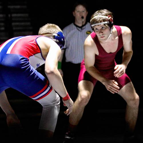Lebanon High's Charlie Clarke, right, stalks John Stark's Dylan Stanley during a 157-pound clash in the NHIAA Division III teams' match on Dec. 13, 2023, in Lebanon, N.H. John Stark won, 66-18. (Valley News - Tris Wykes) Copyright Valley News. May not be reprinted or used online without permission. Send requests to permission@vnews.com.
