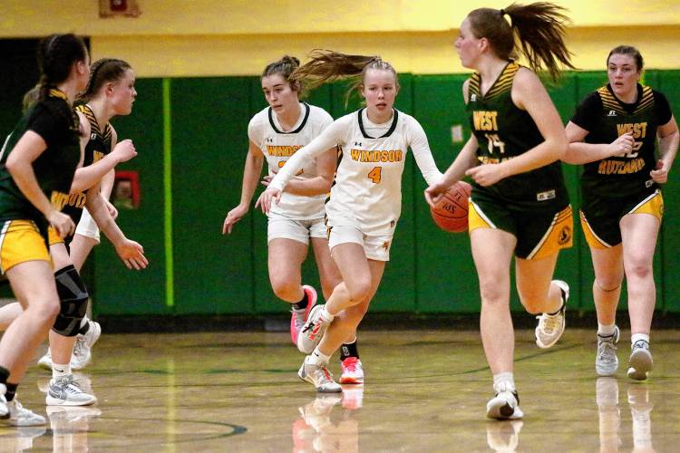 Windsor High's Audrey Rupp (4) dribbles up court ahead of teammate Sydney Perry during their Feb. 22, 2024, game against West Rutland in Windsor, Vt. Windsor won, 53-32. (Valley News - Tris Wykes) Copyright Valley News. May not be reprinted or used online without permission. —Tris Wykes