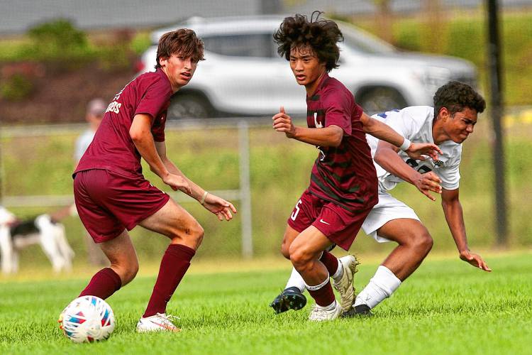 Lebanon High's Benji Madory, left, and Tyler Kelly watch the ball carom away from them during their NHIAA Division II team's 5-1 defeat of Hollis-Brookline on Sept. 11, 2023, in Lebanon, N.H. (Valley News - Tris Wykes) Copyright Valley News. May not be reprinted or used online without permission. Send requests to permission@vnews.com.