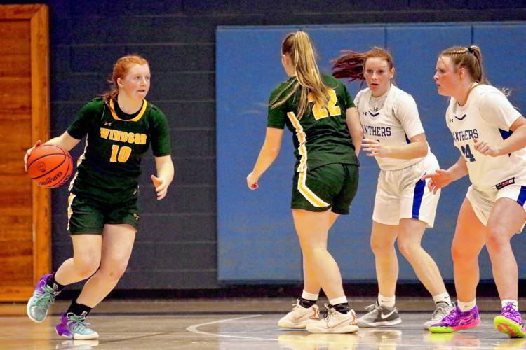 Windsor High's Cassie Clark (10) drives towards the basket from the left wing during her Vermont Division III team's 41-31 defeat of Thetford Academy on Dec. 21, 2023, in Thetford, Vt. (Valley News - Tris Wykes) Copyright Valley News. May not be reprinted or used online without permission. Send requests to permission@vnews.com. 