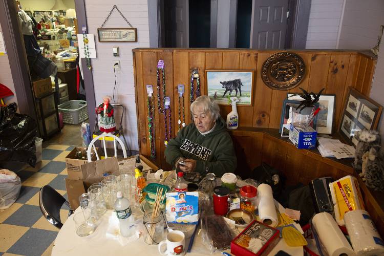 Raelene Lemery packs up glasses for a customer who uses them to make wind chimes at Sunshine Thrift Shop in South Royalton, Vt., on Wednesday, Oct. 11, 2023. The nonprofit thrift store, which Lemery has run for almost 40 years, will close at the end of the month. “It wasn’t about the money,” Lemery said of the store. “It was about helping people.” (Valley News / Report For America - Alex Driehaus) Copyright Valley News. May not be reprinted or used online without permission. Send requests to permission@vnews.com.