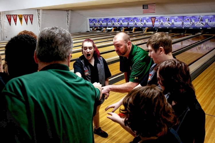 Windsor head coach huddles up with his team before the start of a four-team bowling competition in
 Claremont, N.H., on Feb. 4, 2023. On March 2, 2024, Bly announced his retirement after leading the team for 12 years. (Valley News - Geoff Hansen) Copyright Valley News. May not be reprinted or used online without permission. Send requests to permission@vnews.com.