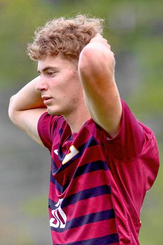 Lebanon High's Chase Adams takes a moment to himself after his shot sailed wide of the net during his NHIAA Division II team's 5-1 defeat of Hollis-Brookline on Sept. 11, 2023, game in Lebanon, N.H. (Valley News - Tris Wykes) Copyright Valley News. May not be reprinted or used online without permission. Send requests to permission@vnews.com.