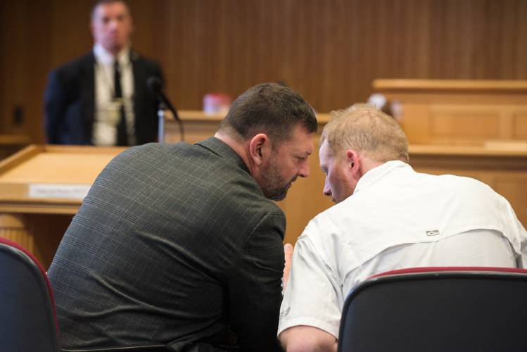 Defense attorney Brian Marsicovetere, left, confers with his client, Jesse Durkee, of South Royalton, during a bail hearing in Windsor Superior Court in White River Junction, Vt., on Monday, Nov. 20, 2023. Deputy State’s Attorney Emily Zakauskas argued to have Durkee's bail revoked after he violated conditions of release. Judge Heather Gray denied the request but amended the conditions. (Valley News - James M. Patterson) Copyright Valley News. May not be reprinted or used online without permission. Send requests to permission@vnews.com.
