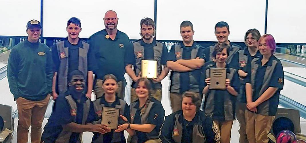 The Windsor bowling team shows off their awards following the VPA team bowling championship in Colchester,Vt., on March 2, 2024. (Courtesy photograph)