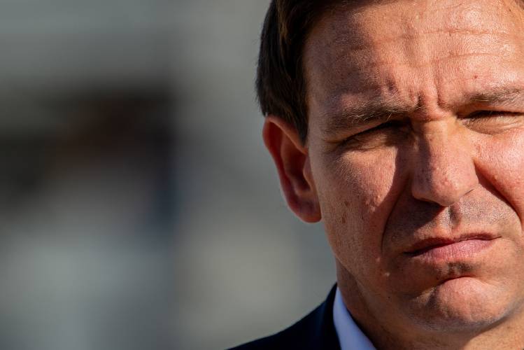 Florida Gov. Ron DeSantis listens during a campaign event at the Permian Deep Rock Oil Company site on Sept. 20, 2023, in Midland, Texas. Gov. DeSantis unveiled future plans on energy policy, climate change ideology and gas production if he is elected president in 2024. (Brandon Bell/Getty Images/TNS)