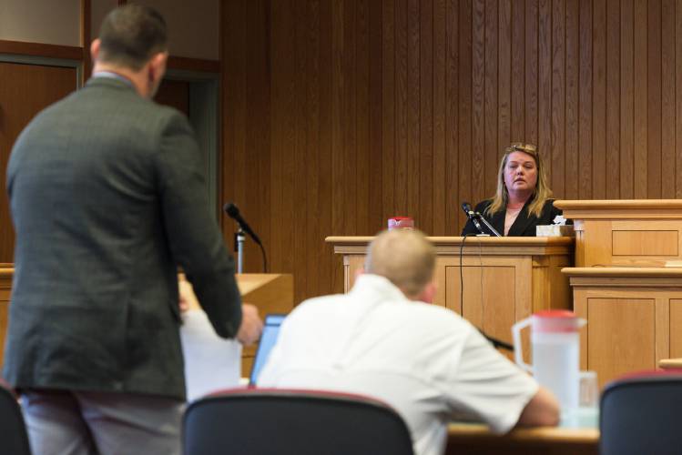 Brian Marsicovetere, left, defense attorney for Jesse Durkee, of South Royalton, middle, questions Beth Willhite, of South Royalton, right, during a hearing in Windsor Superior Court in White River Junction, Vt., on Monday, Nov. 20, 2023. Willhite, whose home was allegedly broken into by Durkee in October, testified in support of a request from Deputy State’s Attorney Emily Zakauskas to revoke Durkee's bail after he violated conditions of release. (Valley News - James M. Patterson) Copyright Valley News. May not be reprinted or used online without permission. Send requests to permission@vnews.com.