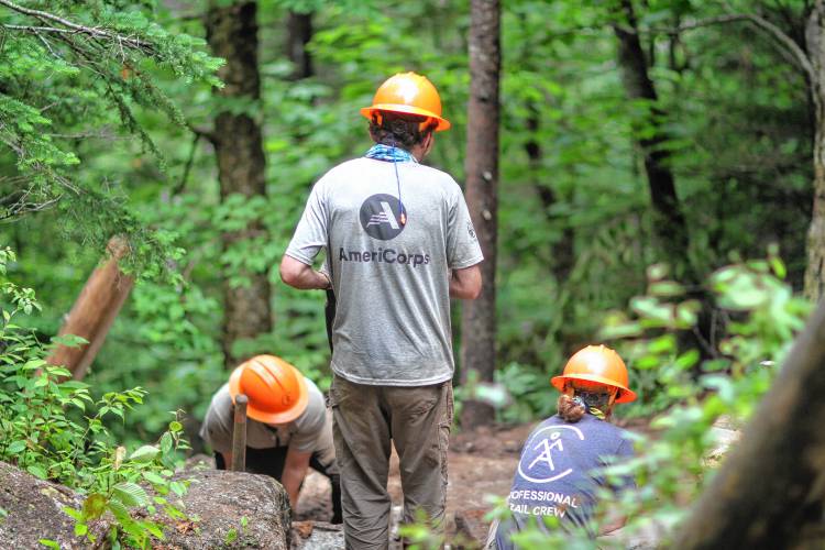 AmeriCorps volunteers are working as trail crew members to help restore the Old Bridle Path. 