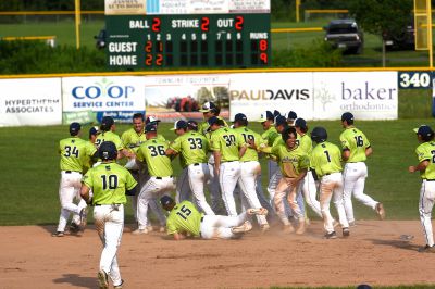 After extra innings, the Upper Valley Nighthawks celebrate their 9-8 win over the Vermont Mountaineers on Thursday, July 14, 2023, in White River Junction, Vt. (Valley News - Jennifer Hauck) Copyright Valley News. May not be reprinted or used online without permission. Send requests to permission@vnews.com.